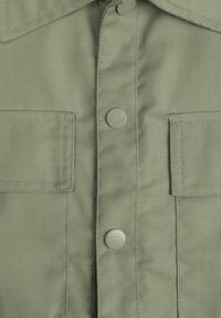 Born2be - Ciemnobeżowy Kombinezon bez Rękawów Zapinany na Guziki z Materiałowym Paskiem Tiamarlia. Okazja: na co dzień. Kolor: beżowy. Materiał: materiał. Długość rękawa: bez rękawów. Styl: klasyczny, casual #7