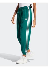 Adidas - adidas Spodnie dresowe Essentials 3-Stripes French Terry Loose-Fit Joggers IL3448 Zielony Loose Fit. Kolor: zielony. Materiał: bawełna #1