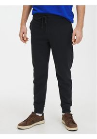 GAP - Gap Spodnie dresowe 500382-09 Czarny Regular Fit. Kolor: czarny. Materiał: dresówka, bawełna