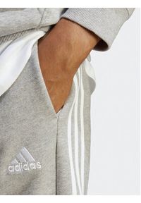 Adidas - adidas Spodnie dresowe Essentials French Terry Tapered Cuff 3-Stripes Joggers IC9407 Szary Regular Fit. Kolor: szary. Materiał: bawełna #3