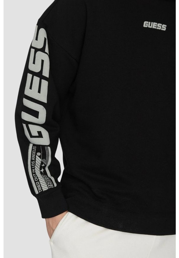 Guess - GUESS Czarna bluza męska Dalim Over, Rozmiar S. Okazja: na co dzień. Kolor: czarny. Materiał: bawełna, poliester. Długość rękawa: długi rękaw. Długość: długie. Styl: casual, klasyczny