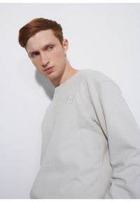 Ochnik - Kremowa bluza męska z logo. Kolor: beżowy. Materiał: materiał