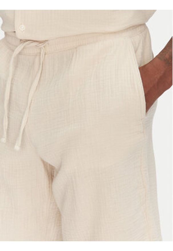 Jack & Jones - Jack&Jones Komplet koszula i szorty materiałowe Easter 12281255 Beżowy Relaxed Fit. Kolor: beżowy. Materiał: bawełna