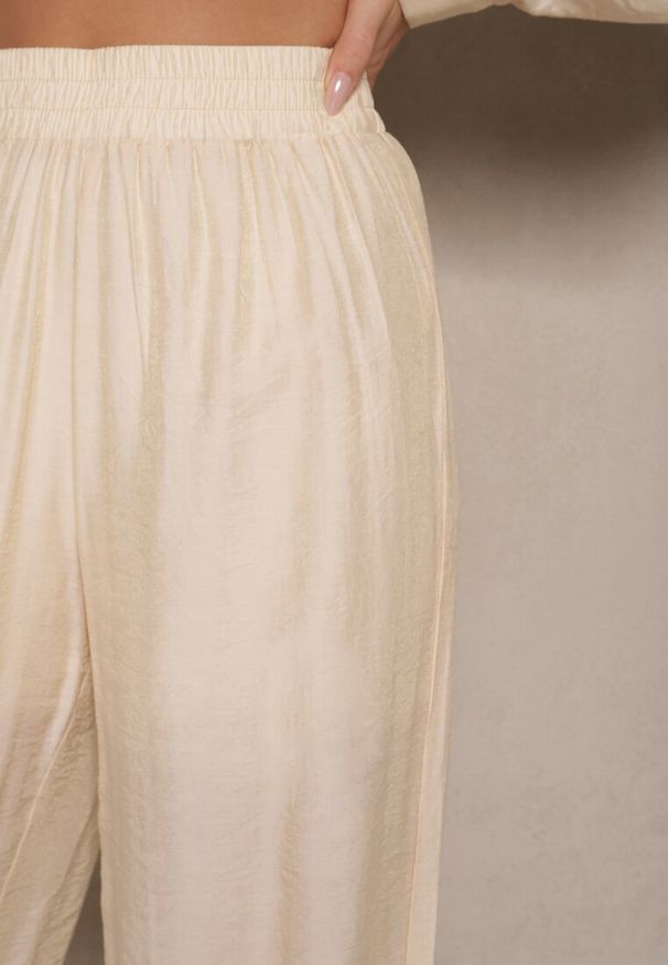 Renee - Jasnobeżowe Spodnie Palazzo High Waist z Szeroką Nogawką i Gumką w Talii Jenarielis. Okazja: na co dzień. Stan: podwyższony. Kolor: beżowy. Styl: casual