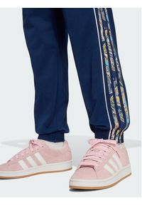 Adidas - adidas Spodnie dresowe Sst KR9187 Granatowy Loose Fit. Kolor: niebieski. Materiał: syntetyk #3