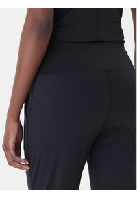 Under Armour Spodnie dresowe Motion 1375077 Czarny Slim Fit. Kolor: czarny. Materiał: syntetyk #3