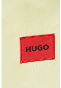 Hugo - HUGO spodnie damskie kolor żółty gładkie. Kolor: żółty. Materiał: dzianina. Wzór: gładki #4