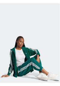 Adidas - adidas Spodnie dresowe Essentials 3-Stripes French Terry Loose-Fit Joggers IL3448 Zielony Loose Fit. Kolor: zielony. Materiał: bawełna #3