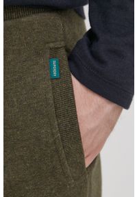 Superdry Spodnie męskie kolor beżowy gładkie. Kolor: zielony. Materiał: dzianina. Wzór: gładki #3