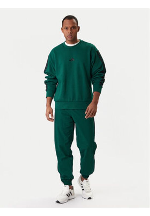 Adidas - adidas Bluza Essentials 3-Stripes JE6306 Zielony Regular Fit. Kolor: zielony. Materiał: syntetyk