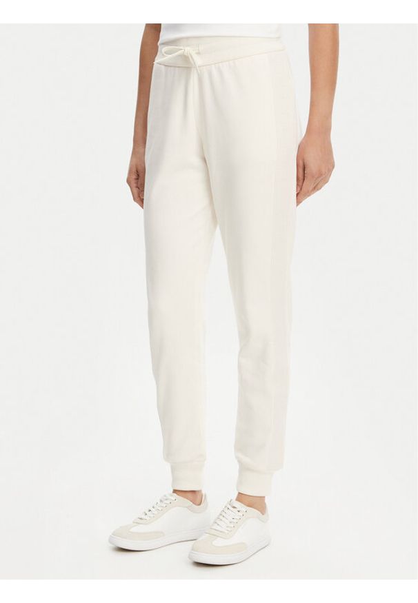 Armani Exchange Spodnie dresowe XW000503 AF12804 U1003 Écru Regular Fit. Kolor: kremowy. Materiał: bawełna