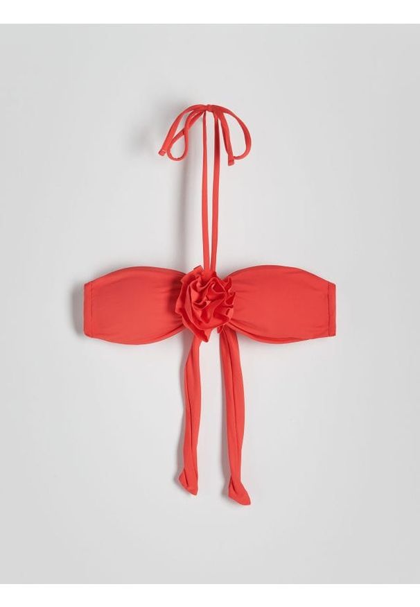 Reserved - Góra od bikini - koralowy. Kolor: pomarańczowy. Materiał: materiał. Wzór: gładki
