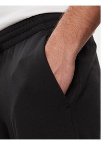 Adidas - adidas Spodnie dresowe Essentials French Terry Tapered Cuff Logo Joggers HA4342 Czarny Regular Fit. Kolor: czarny. Materiał: bawełna #3