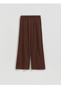 Reserved - Spodnie dresowe - ciemnobrązowy. Kolor: brązowy. Materiał: dresówka #1
