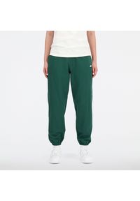 Spodnie damskie New Balance WP31503NWG – zielone. Kolor: zielony. Materiał: dresówka, prążkowany, bawełna, materiał