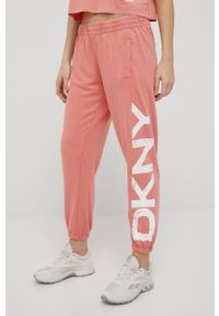 DKNY - Dkny spodnie damskie kolor różowy z nadrukiem. Kolor: różowy. Wzór: nadruk