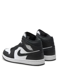 Nike Air Jordan 1 Mid SE Sneakersy męskie. Okazja: na co dzień. Kolor: czarny. Materiał: guma, syntetyk, materiał, skóra. Szerokość cholewki: normalna. Model: Nike Air Jordan #5