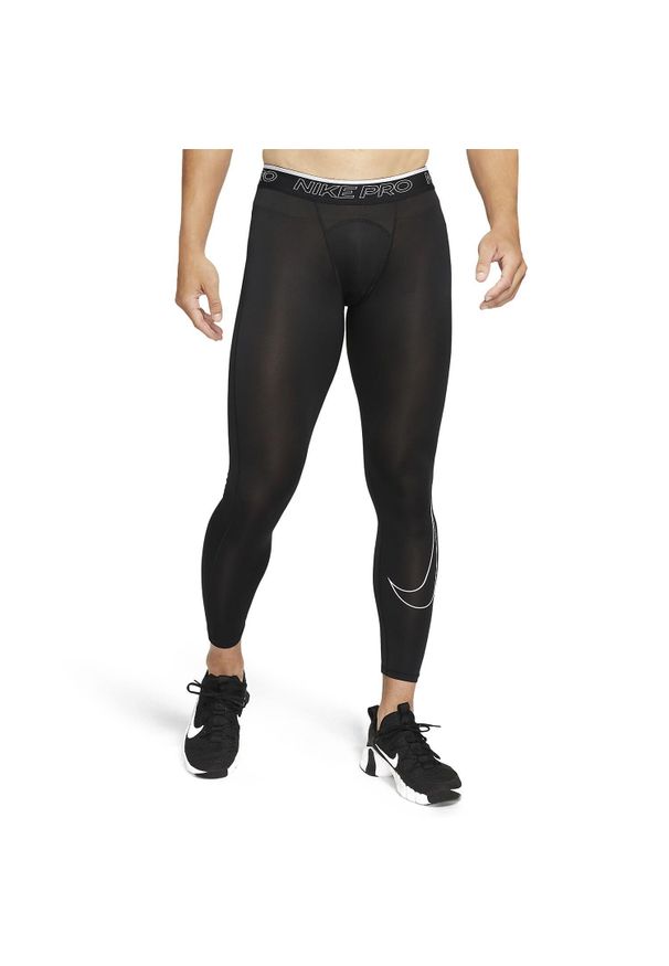 Spodnie treningowe męskie Nike Pro Drifit Tight. Kolor: czarny, biały, wielokolorowy. Materiał: poliester. Sport: bieganie
