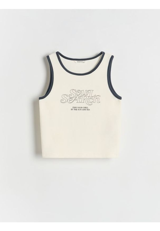 Reserved - Top z nadrukiem - złamana biel. Materiał: bawełna, dzianina. Wzór: nadruk