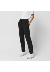 outhorn - Spodnie dresowe z rozcięciami damskie - czarne. Kolor: czarny. Materiał: dresówka. Wzór: gładki, ze splotem