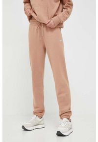DKNY - Dkny spodnie dresowe kolor brązowy gładkie. Kolor: brązowy. Materiał: dresówka. Wzór: gładki