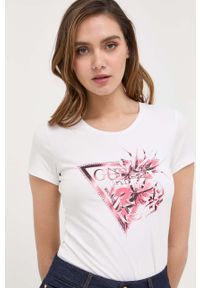 Guess t-shirt damski kolor beżowy. Kolor: beżowy. Materiał: bawełna. Długość rękawa: krótki rękaw. Długość: krótkie. Styl: klasyczny