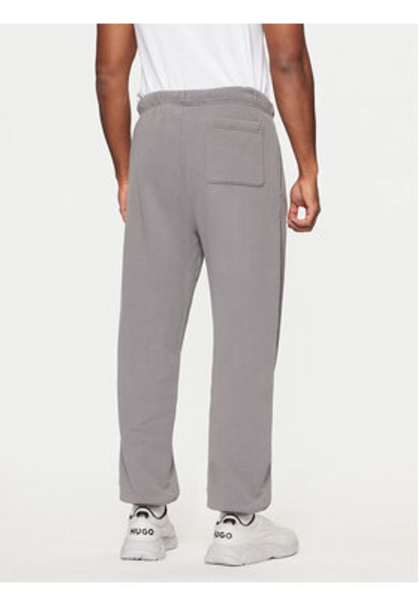 Hugo - HUGO Spodnie dresowe Dopee 50540938 Szary Regular Fit. Kolor: szary. Materiał: bawełna