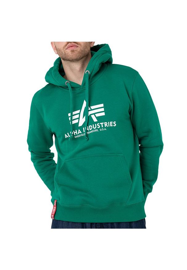 Bluza Alpha Industries Basic Hoody 178312668 - zielona. Typ kołnierza: kaptur. Kolor: zielony. Materiał: poliester, bawełna. Wzór: aplikacja. Styl: klasyczny