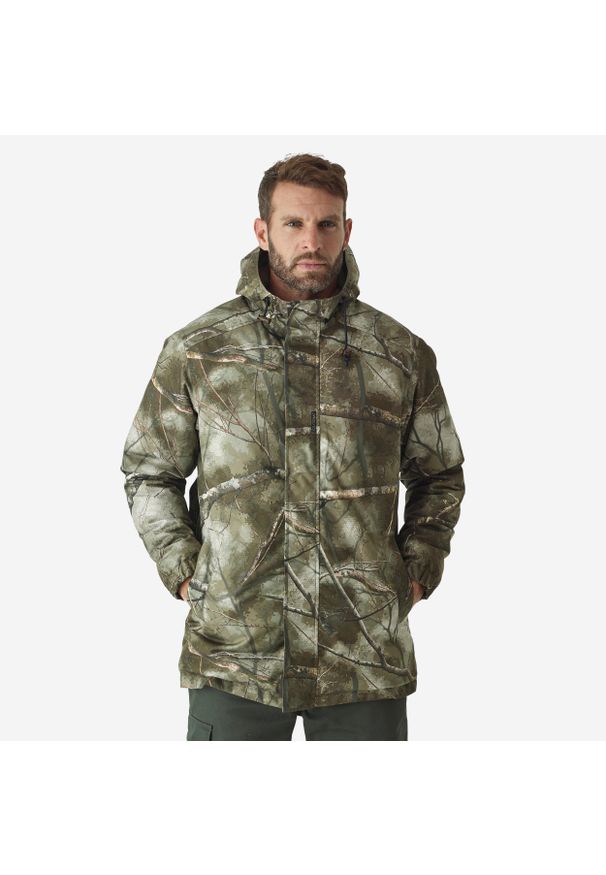 SOLOGNAC - Kurtka myśliwska Solognac Warm 100 wodoodporna camo treemetic. Kolor: zielony, brązowy, wielokolorowy. Materiał: materiał, tkanina, polar