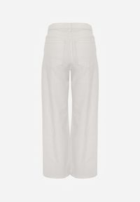 Renee - Białe Bawełniane Jeansy Wide Leg z Asymetrycznym Guzikiem Thesiphi. Kolor: biały #2