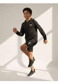 Sinsay - Szorty sportowe - czarny. Kolor: czarny. Styl: sportowy #1