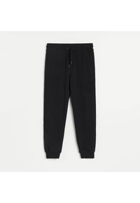 Reserved - Spodnie dresowe slim fit - Czarny. Kolor: czarny. Materiał: dresówka #1
