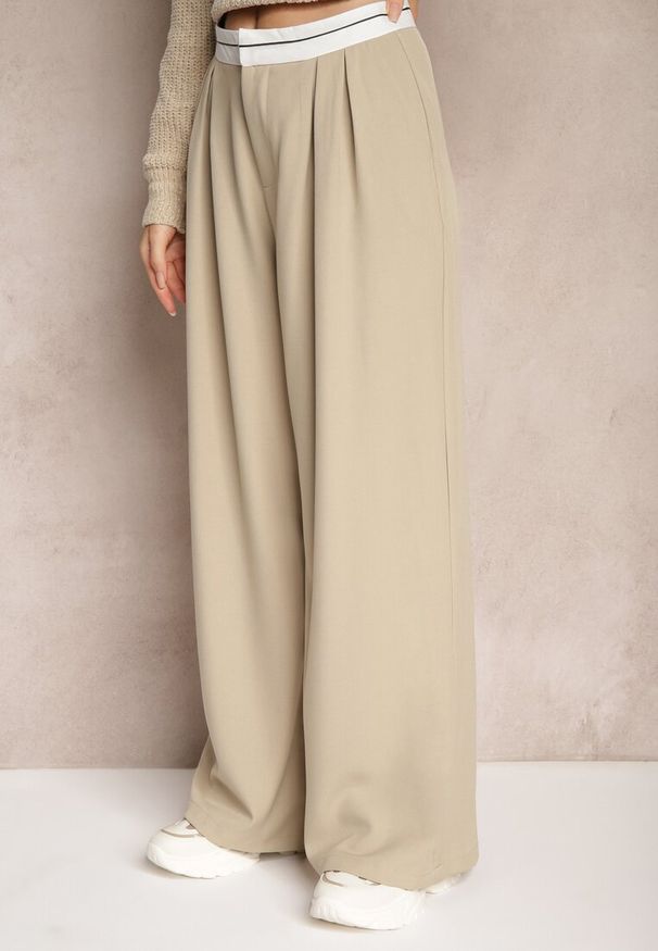 Renee - Beżowe Spodnie z Wiskozy Palazzo High Waist Zapinane na Suwak Nellieva. Okazja: na co dzień. Stan: podwyższony. Kolor: beżowy. Materiał: wiskoza. Styl: casual