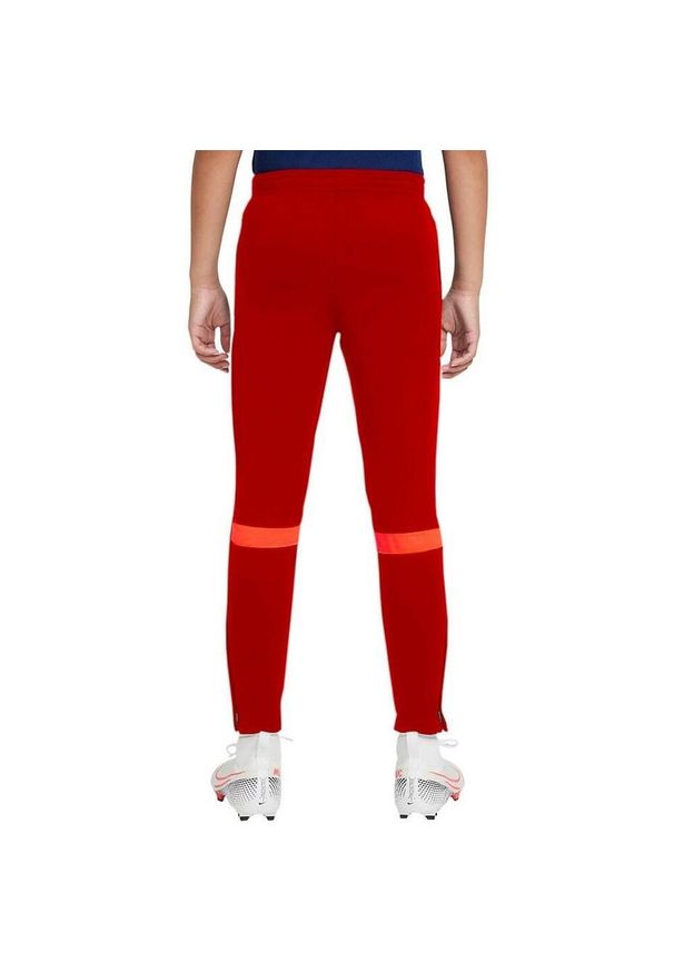 Nike - Spodnie Dresowe Dla Dzieci Academy 21 DriFIT. Kolor: czerwony. Materiał: dresówka