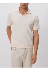 Reserved - Koszulka polo comfort fit - złamana biel. Typ kołnierza: polo. Materiał: bawełna