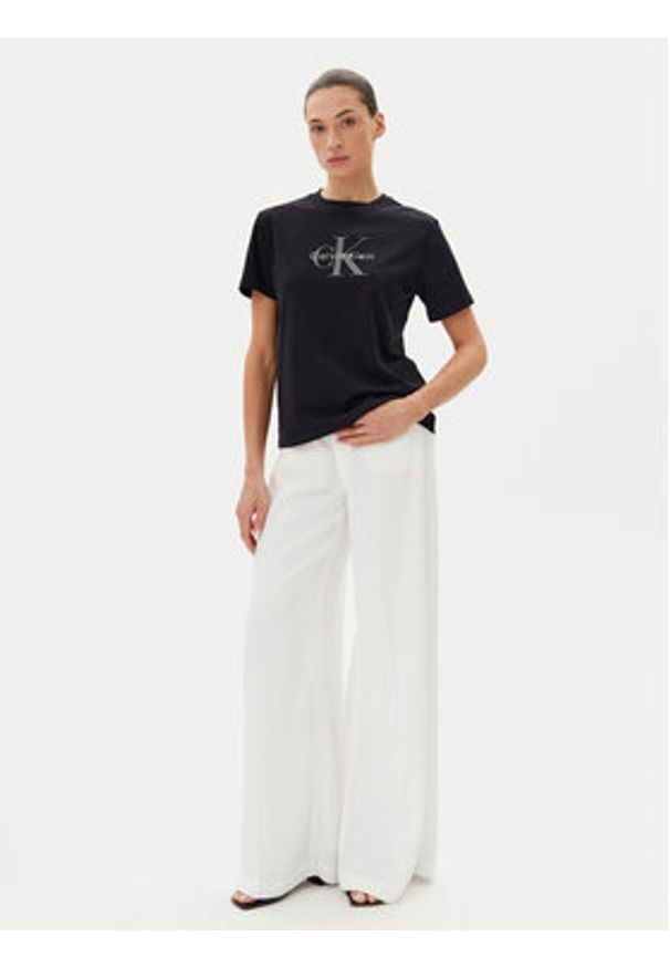 Calvin Klein Jeans T-Shirt Hero LV047B865G Czarny Regular Fit. Kolor: czarny. Materiał: bawełna