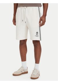 TOMMY HILFIGER - Tommy Hilfiger Szorty sportowe Crest Embroidery MW0MW42878 Beżowy jasny Relaxed Fit. Kolor: beżowy. Materiał: bawełna. Styl: sportowy #1