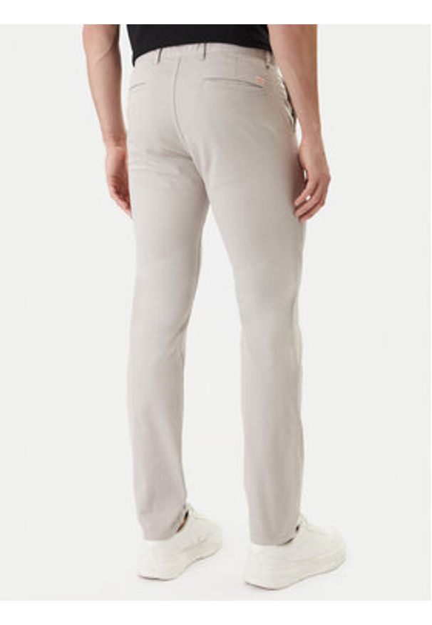 BOSS Chinosy 50510933 Beżowy Slim Fit. Kolor: beżowy. Materiał: bawełna