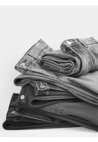Reserved - Jeansy wide leg - czarny. Kolor: czarny