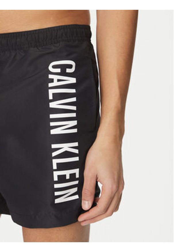 Calvin Klein Swimwear Szorty kąpielowe KM0KM01092 Czarny Regular Fit. Kolor: czarny. Materiał: syntetyk