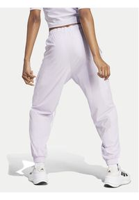 Adidas - adidas Spodnie dresowe Dance All-Gender Versatile IS0907 Fioletowy Loose Fit. Kolor: fioletowy. Materiał: syntetyk