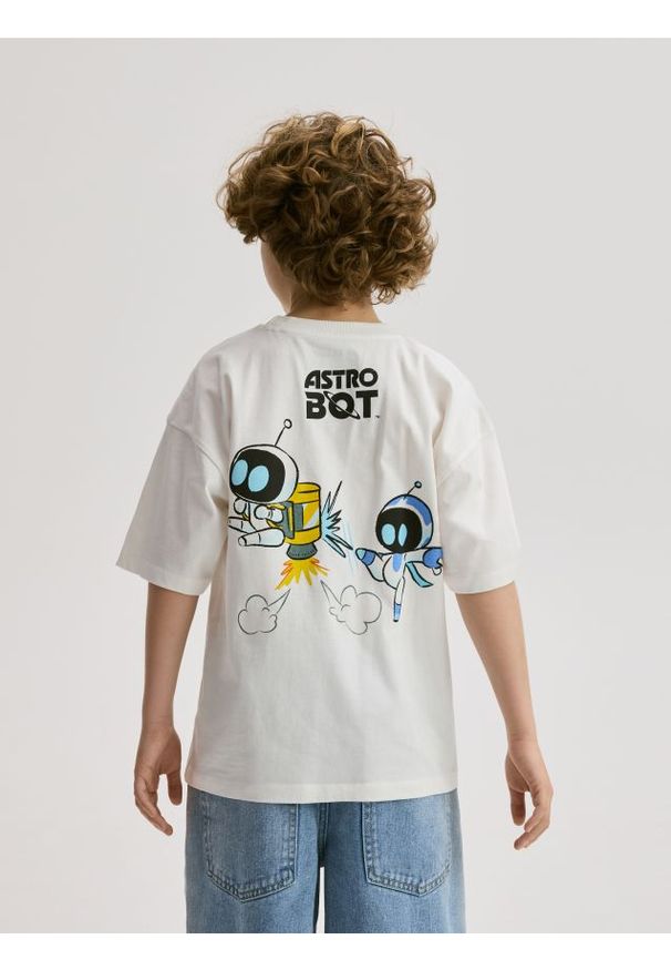 Reserved - T-shirt Astro Bot - złamana biel. Materiał: dzianina, bawełna