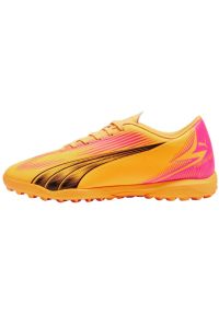 Buty piłkarskie Puma Ultra Play Tt Jr 107779 03 pomarańczowe. Zapięcie: sznurówki. Kolor: pomarańczowy. Materiał: syntetyk, guma. Szerokość cholewki: normalna. Wzór: nadruk. Sport: piłka nożna