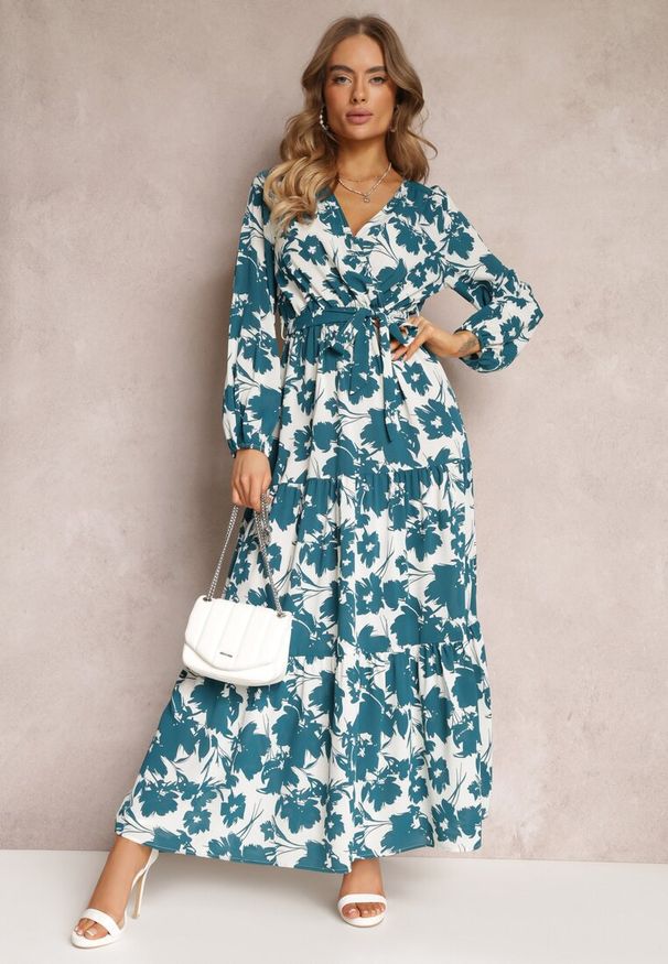 Renee - Zielona Sukienka Kharano. Kolor: zielony. Materiał: tkanina, materiał. Długość rękawa: długi rękaw. Wzór: kwiaty. Typ sukienki: kopertowe. Styl: klasyczny. Długość: midi