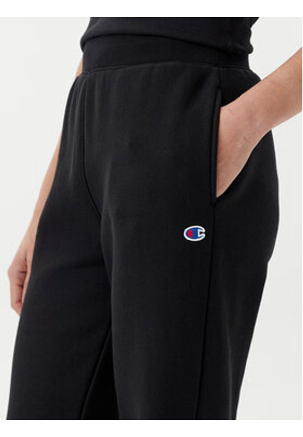 Champion Spodnie dresowe 117983 Czarny Slim Fit. Kolor: czarny. Materiał: bawełna