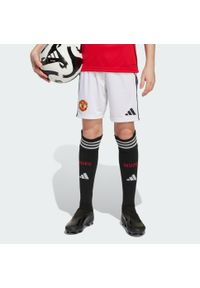 Adidas - Szorty Manchester United 25/26 Home Kids. Kolor: biały. Sport: piłka nożna