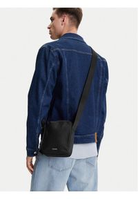 Calvin Klein Saszetka Ck Ease Reporter S K50K512886 Czarny. Kolor: czarny. Materiał: materiał #1