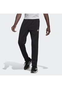 Adidas - Zwężany kombinezon do joggingu z małym logo adidas Aeroready Game and Go. Kolor: czarny. Materiał: dresówka. Długość: długie. Sport: bieganie, fitness #1