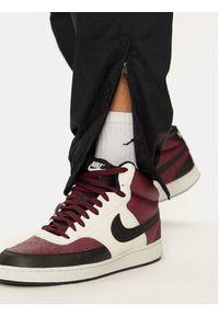 Nike Spodnie dresowe FN5850 Czarny Regular Fit. Kolor: czarny. Materiał: syntetyk #4