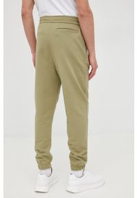 Calvin Klein Jeans spodnie bawełniane męskie kolor zielony gładkie. Kolor: zielony. Materiał: bawełna. Wzór: gładki